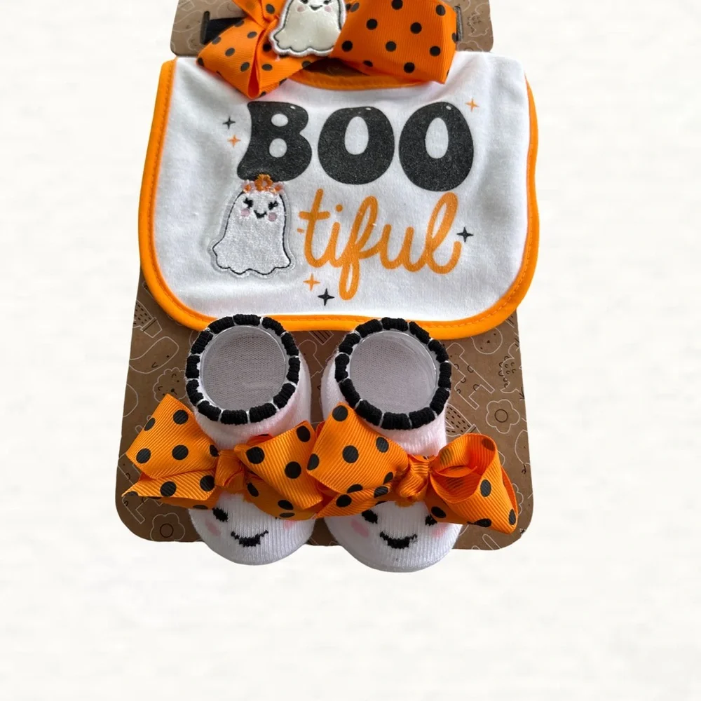 baby Halloween bib, headband, and socks set with a 